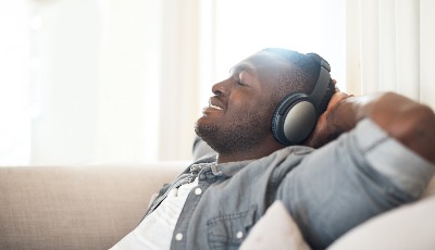 Man relaxing with headphones