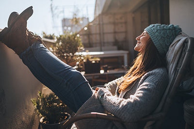 woman relaxing in sunshine