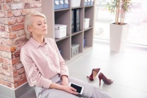 woman meditating on floor