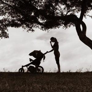 woman pushing baby carriage illustration