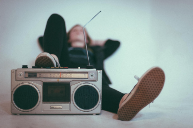 Man listening to boom box