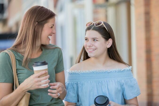 Mother and daughter enjoying coffee