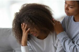 woman being comforted