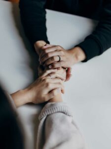 people holding hands