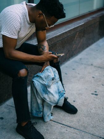 teenage boy using a smart phone